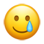 Emoji visage souriant avec une larme U+1F972