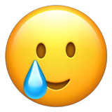 Visage souriant avec une larme