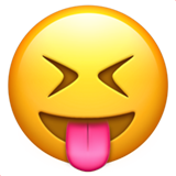 Visage qui tire la langue les yeux plissés